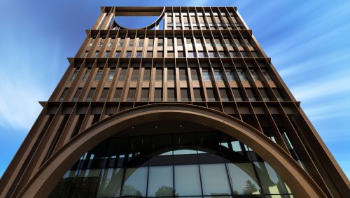 Façade de la Maison de l’Innovation à Nantes, reflet du soleil au zénithi sur les panneaux métalliques